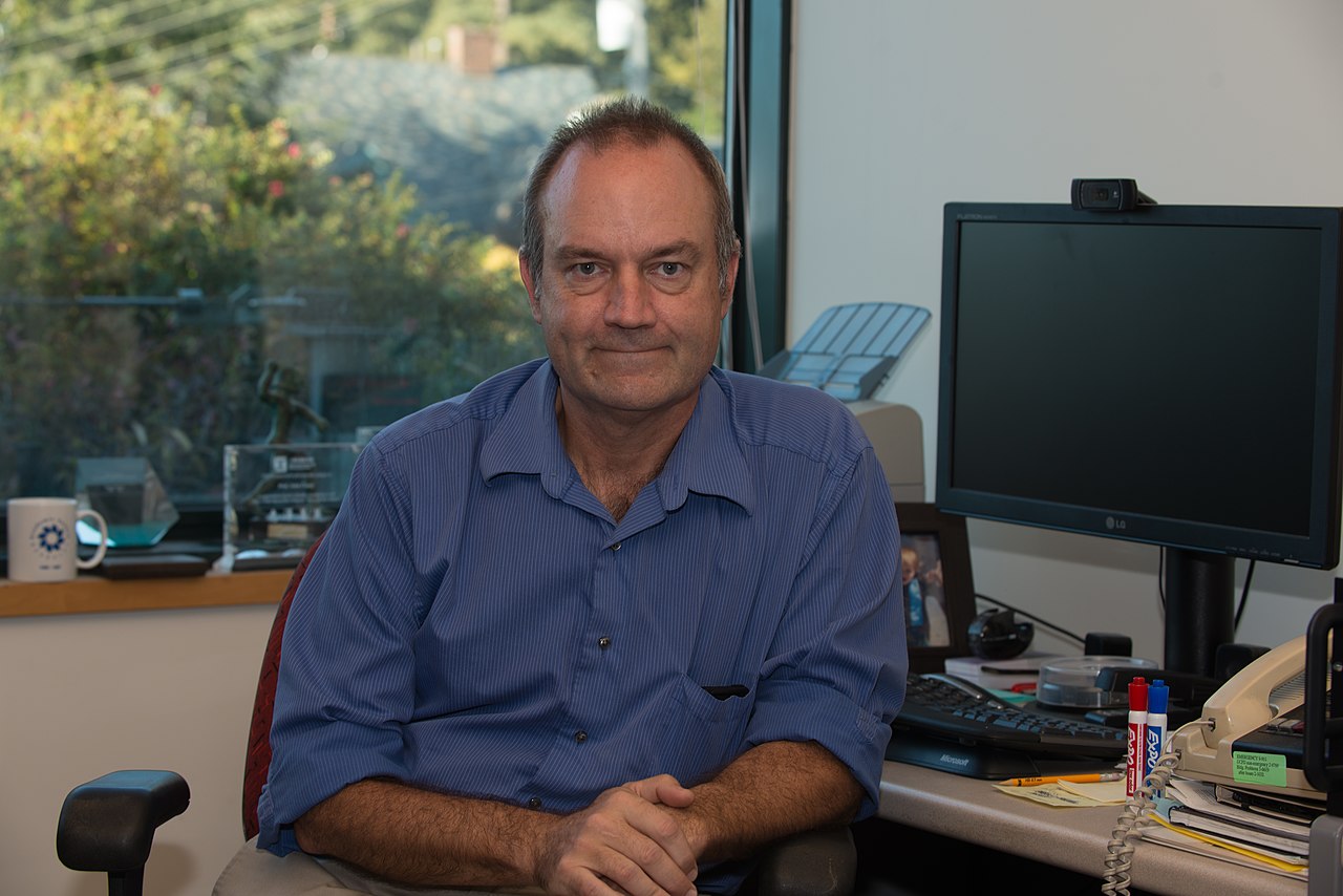John Canny seated in his office at UC Berkeley.