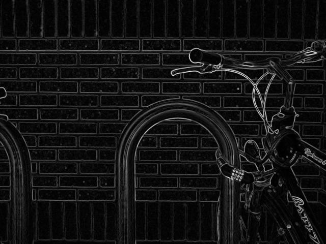 A grayscale bicycle leaning on a brick wall, transformed so only the edges glow white against pure black.