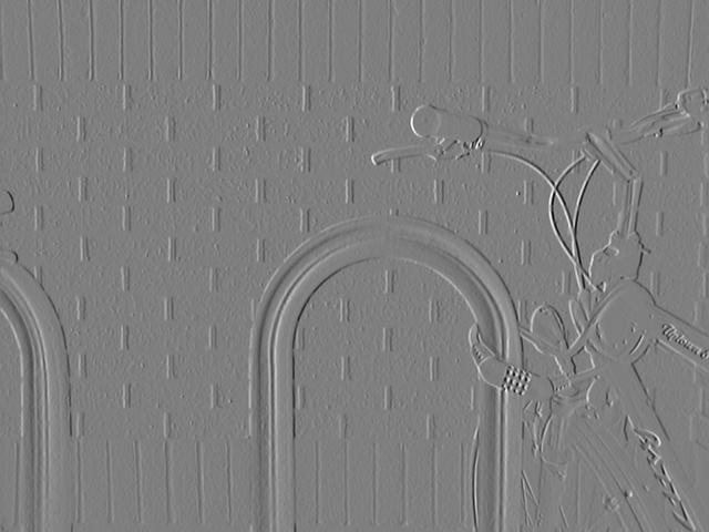 The bicycle after a vertical Sobel kernel: now the horizontal brick mortar lines are emphasized and vertical edges fade.