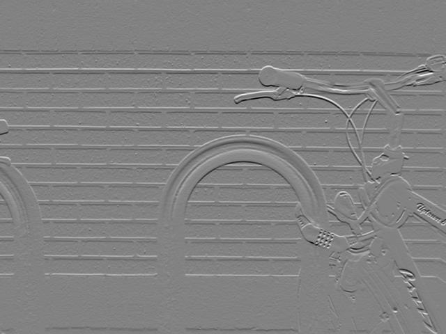 The bicycle after a horizontal Sobel kernel: a flat grey field where the original was smooth, with vertical edges raised like an emboss.